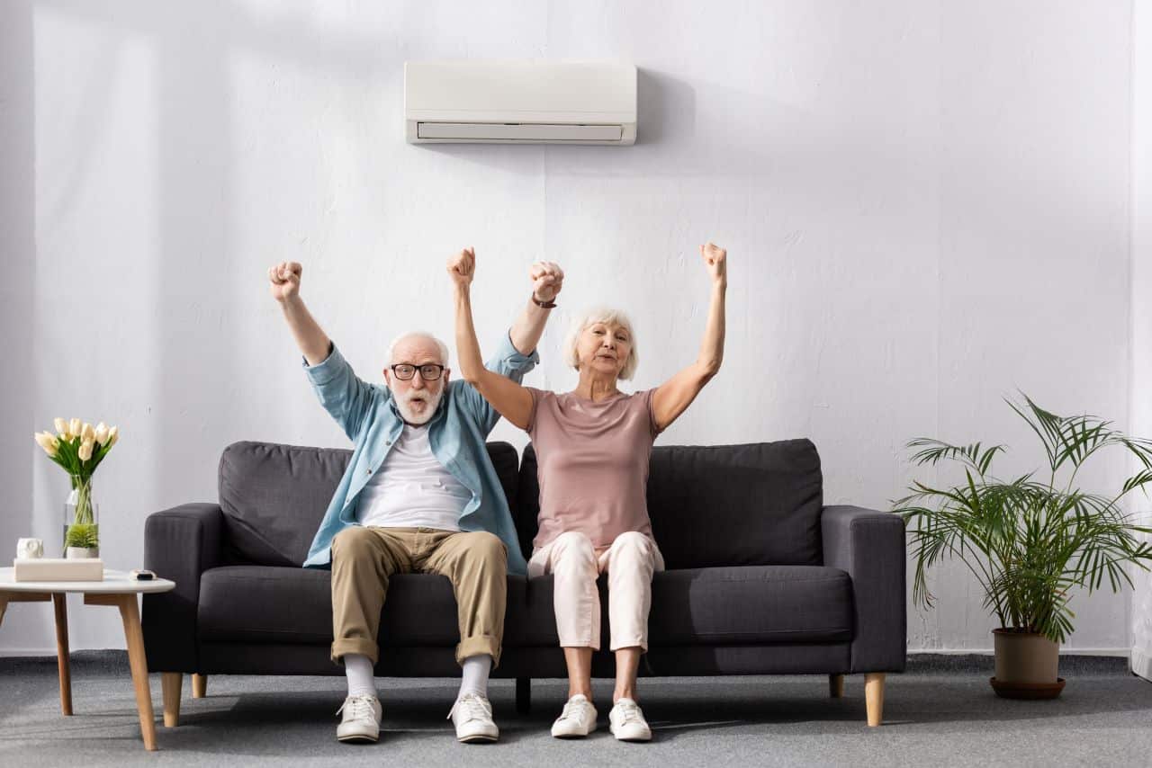 Older couple enjoying heat pump over summer